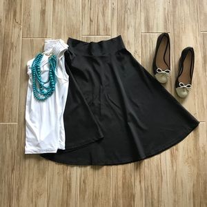 Black mid-length skater skirt Size S EUC